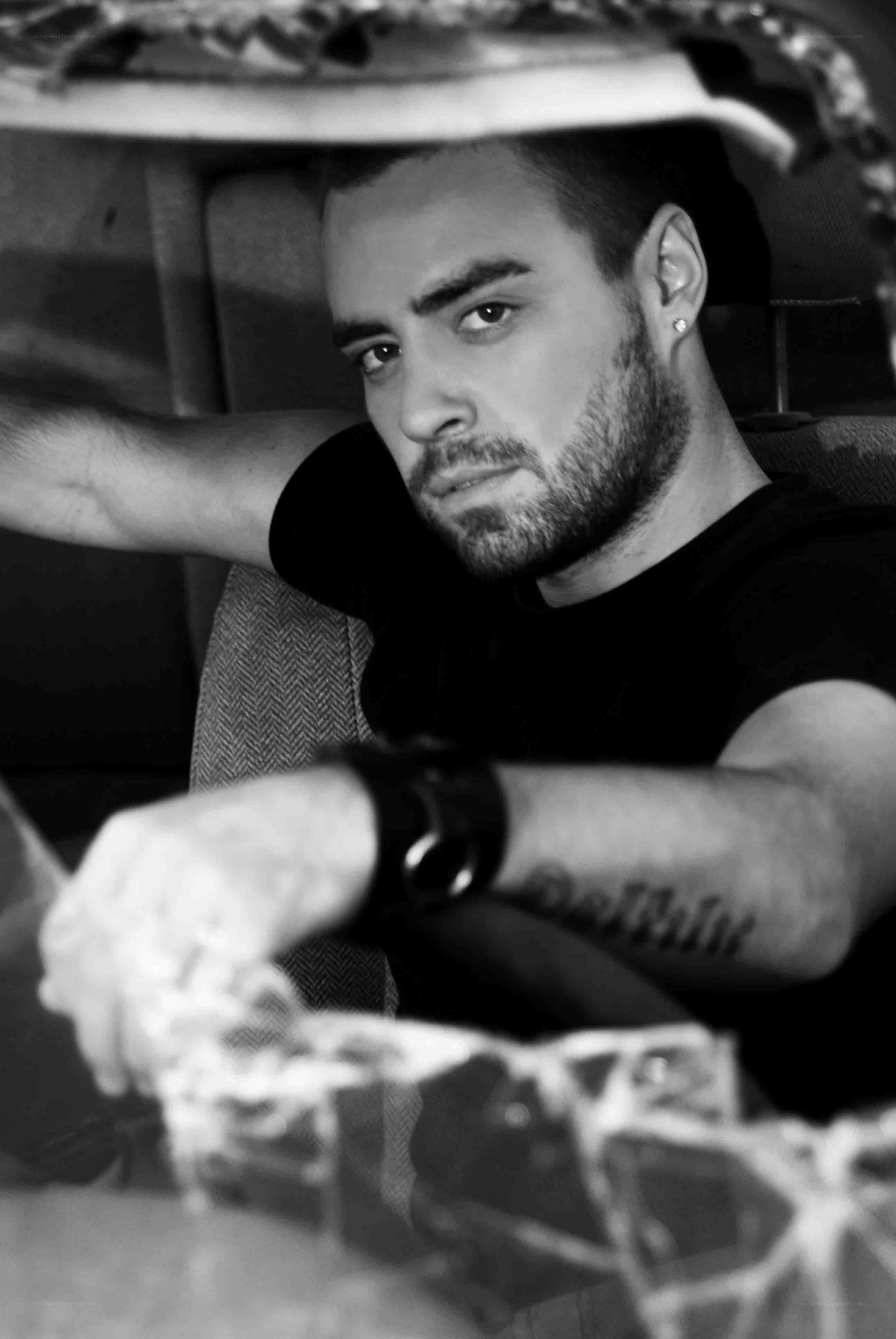man in car looking at camera