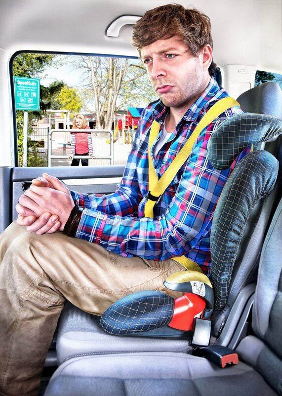 Man in car seat with child