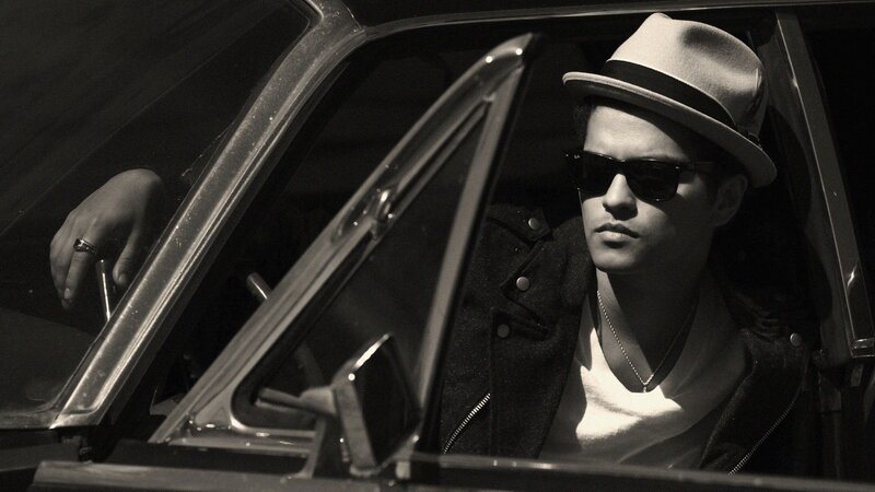 Man in Car Wearing Hat