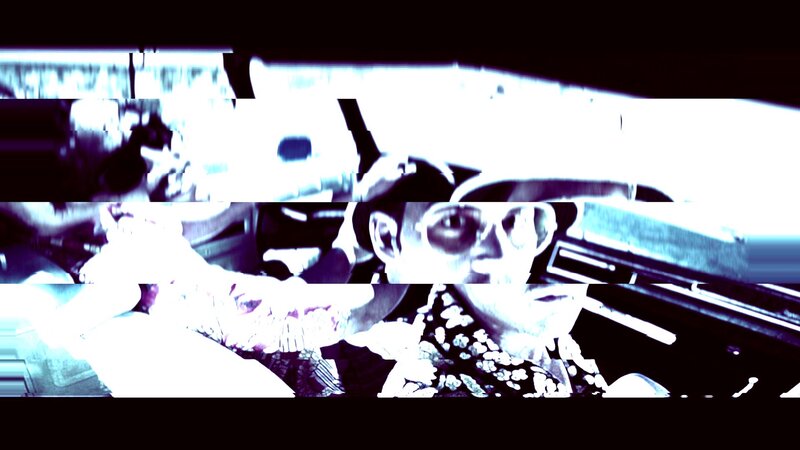 Man in Car Wearing Hat — White