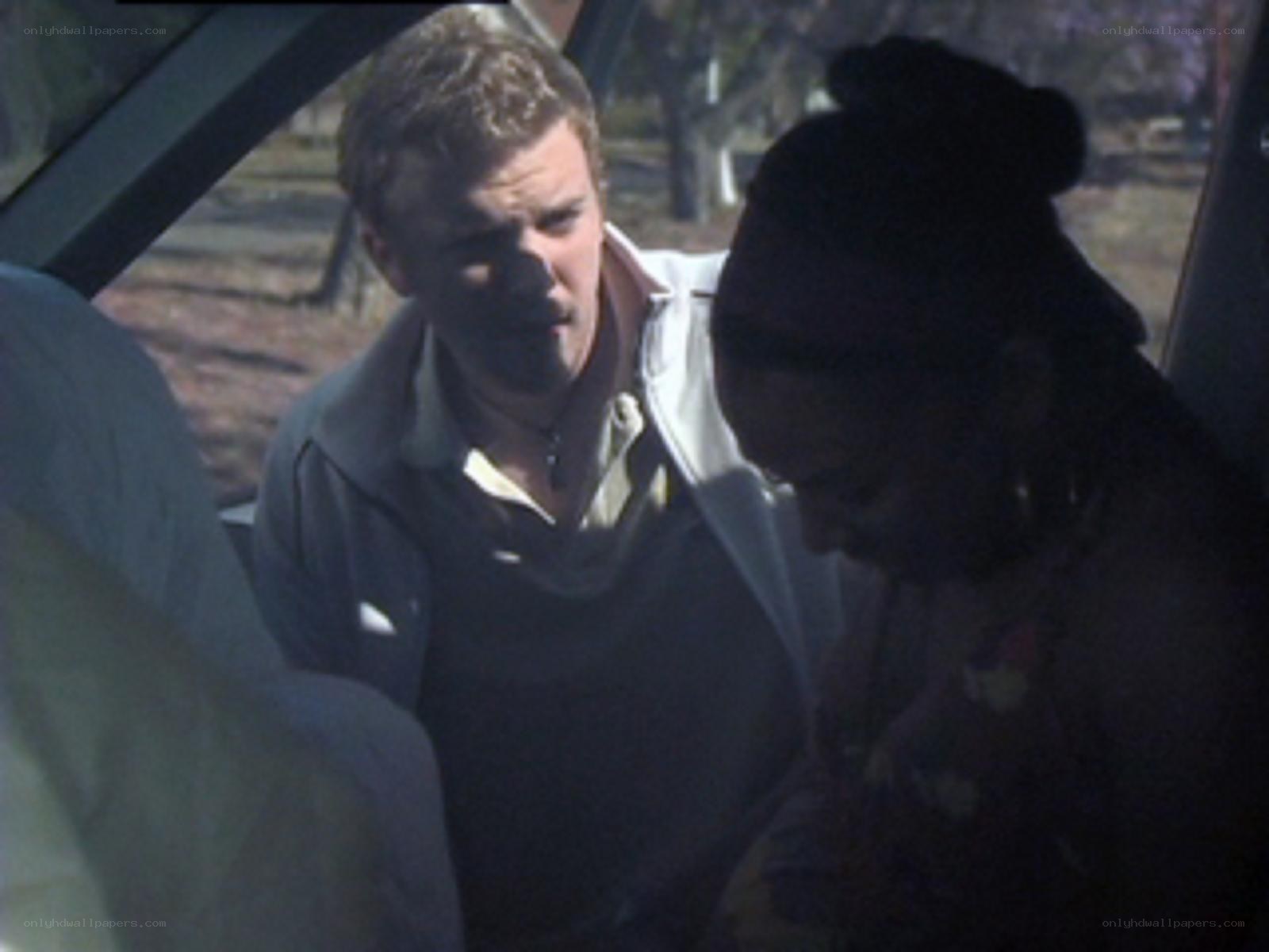 man in car with another person