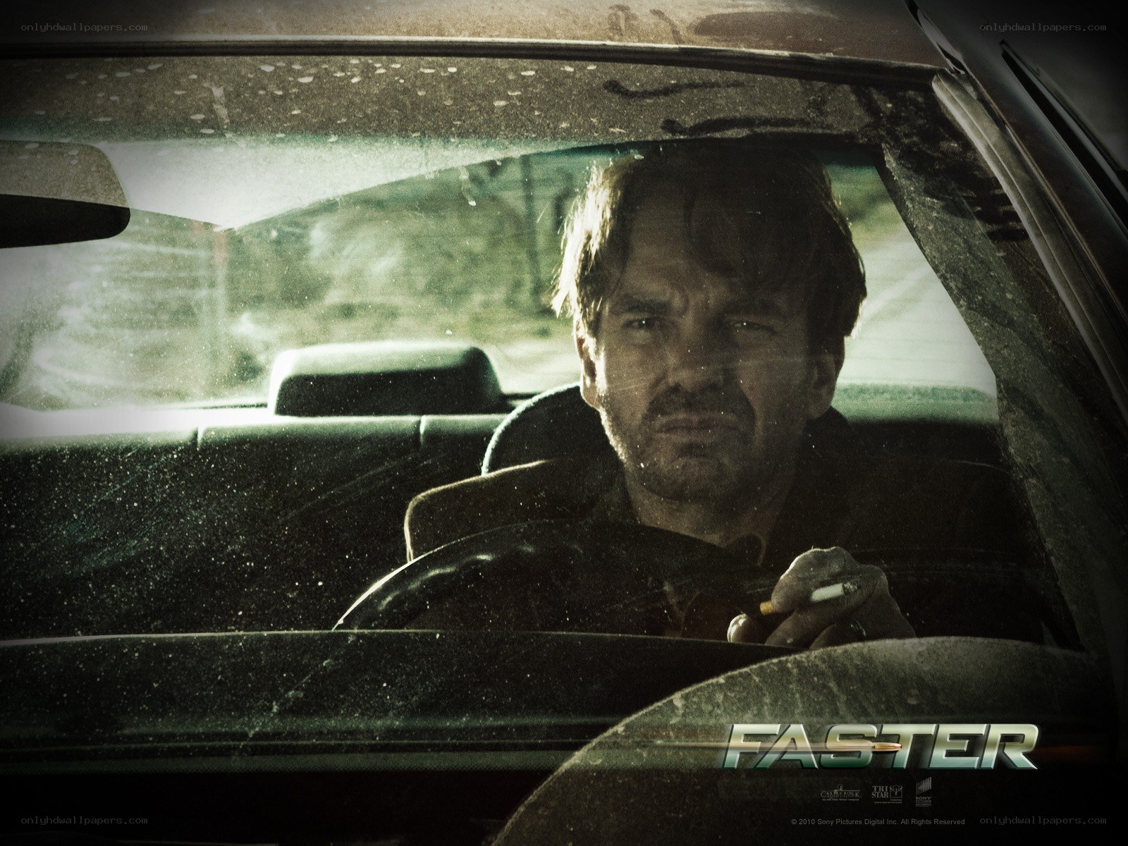 man in car with cigarette