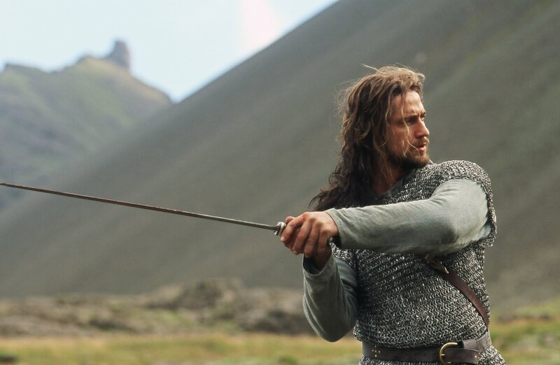 Man in Chainmail Holding Sword