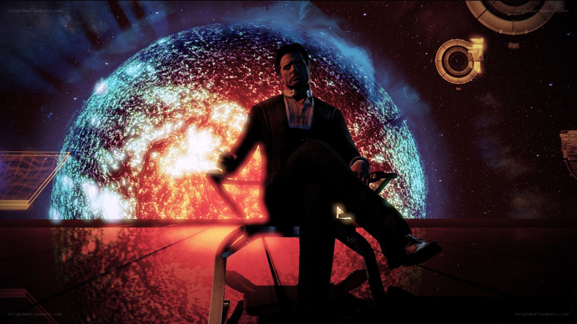 man in chair with planet background