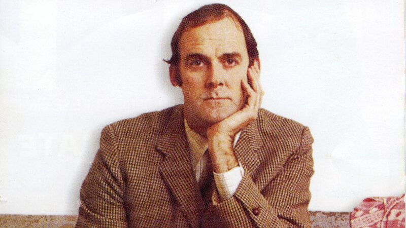 man in checkered suit