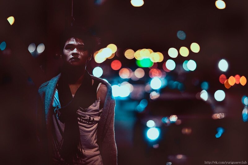 man in city at night