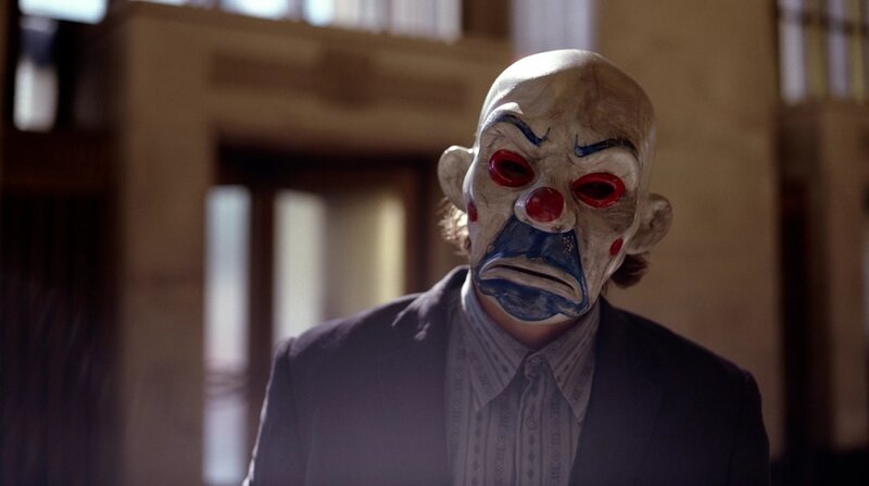 man in clown mask