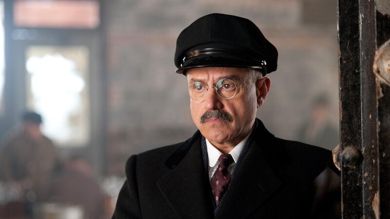 Man in Coat and Cap — Black