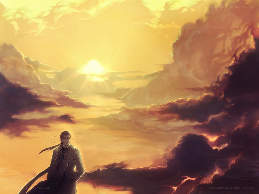 man in coat at sunset