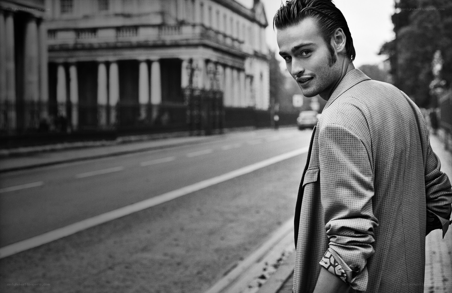 man in coat on city street