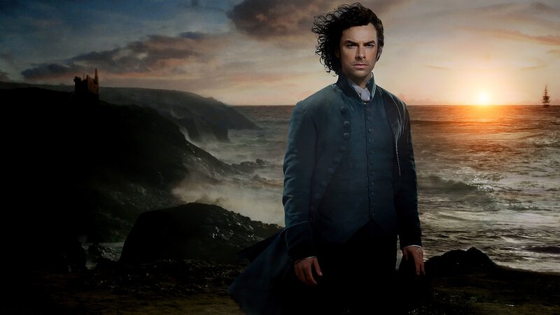 Man in Coat on Cliff