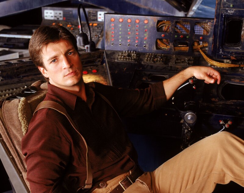 man in cockpit of spaceship