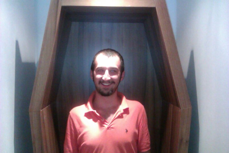 man in coffin-shaped structure