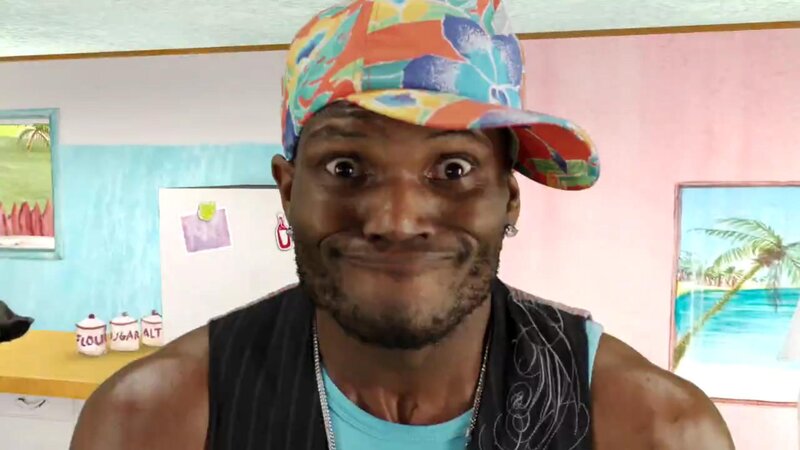 man in colorful hat smiling