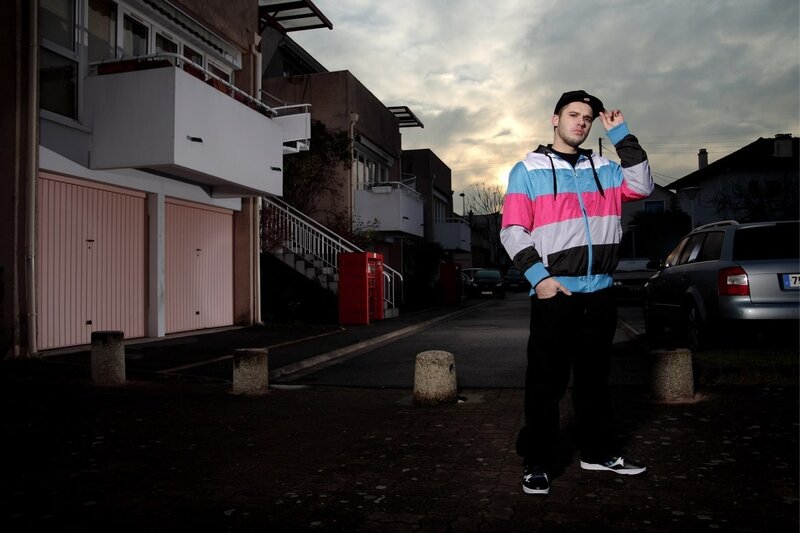 Man in Colorful Jacket — Black