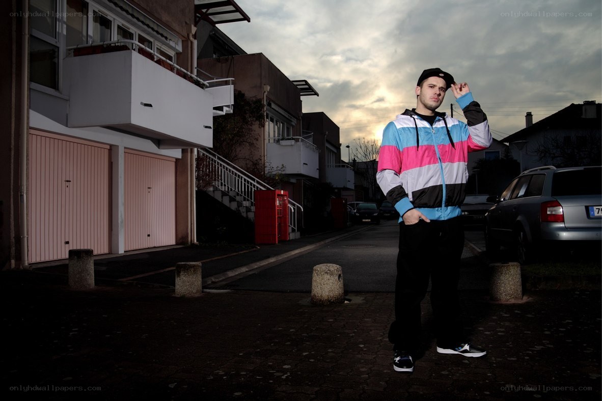 Man in colorful jacket on street