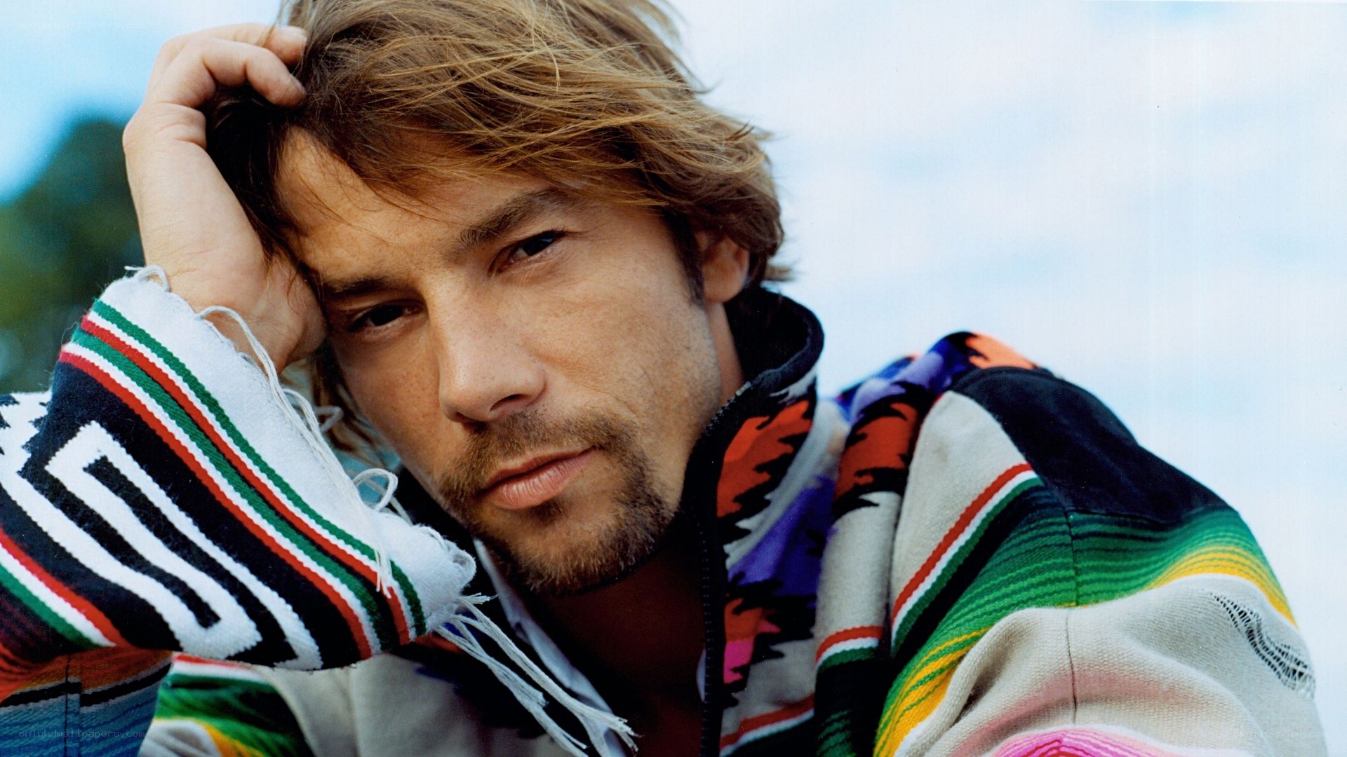 man in colorful sweater