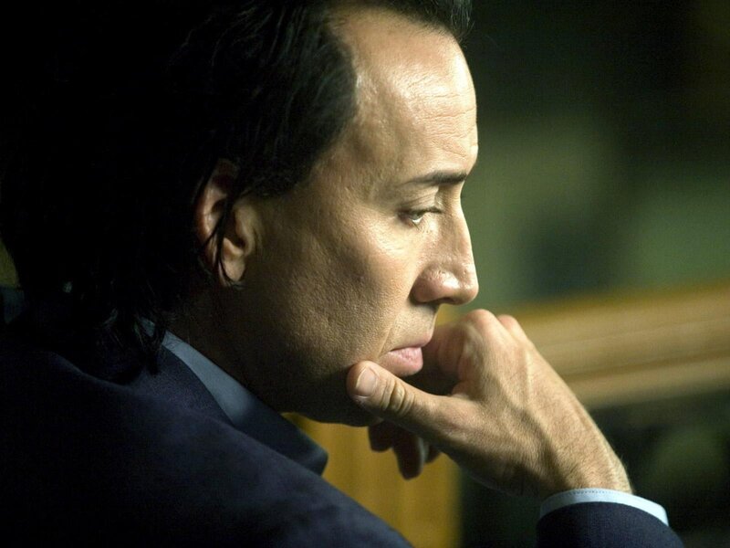 man in contemplative pose