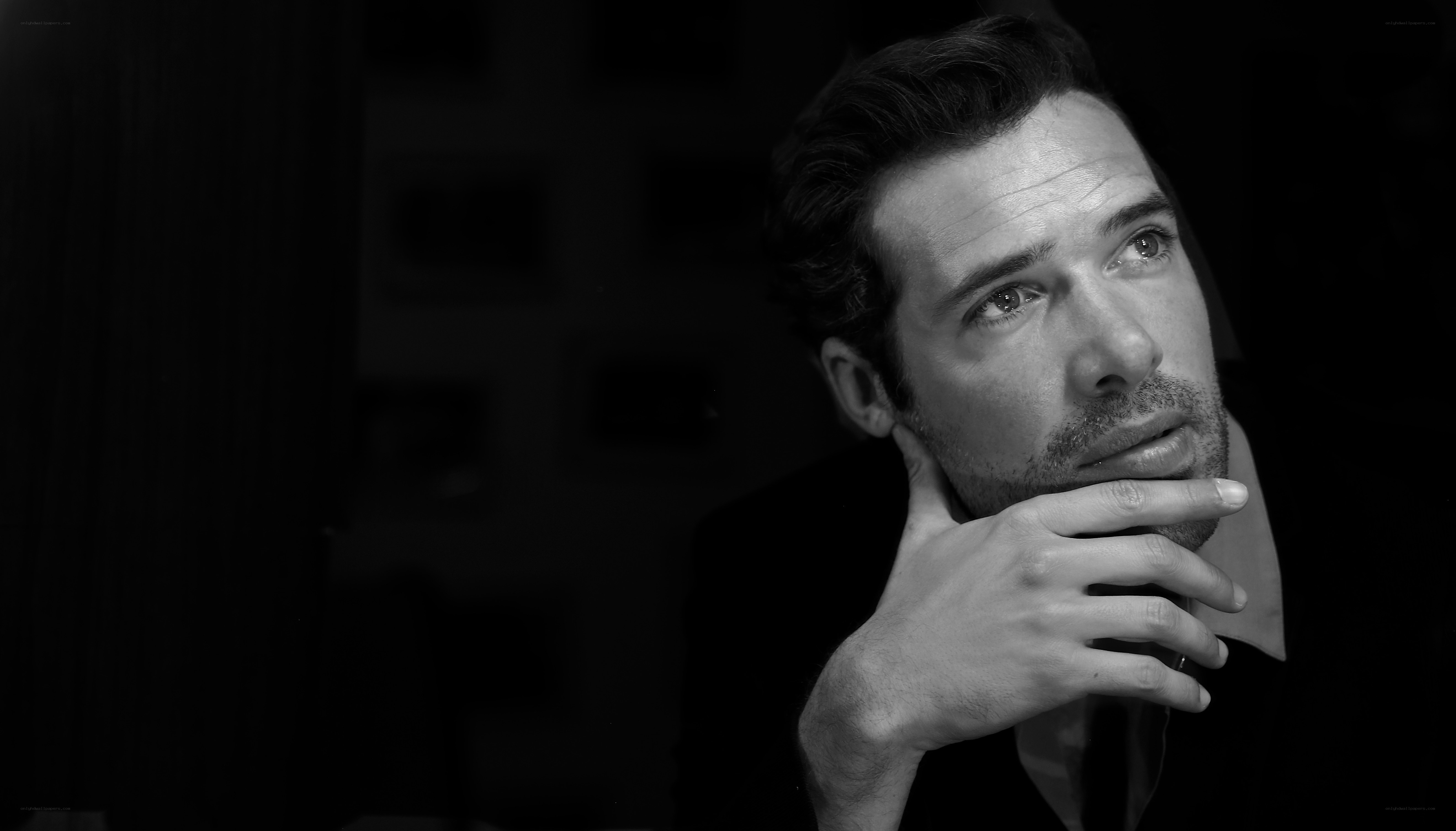 man in contemplative pose