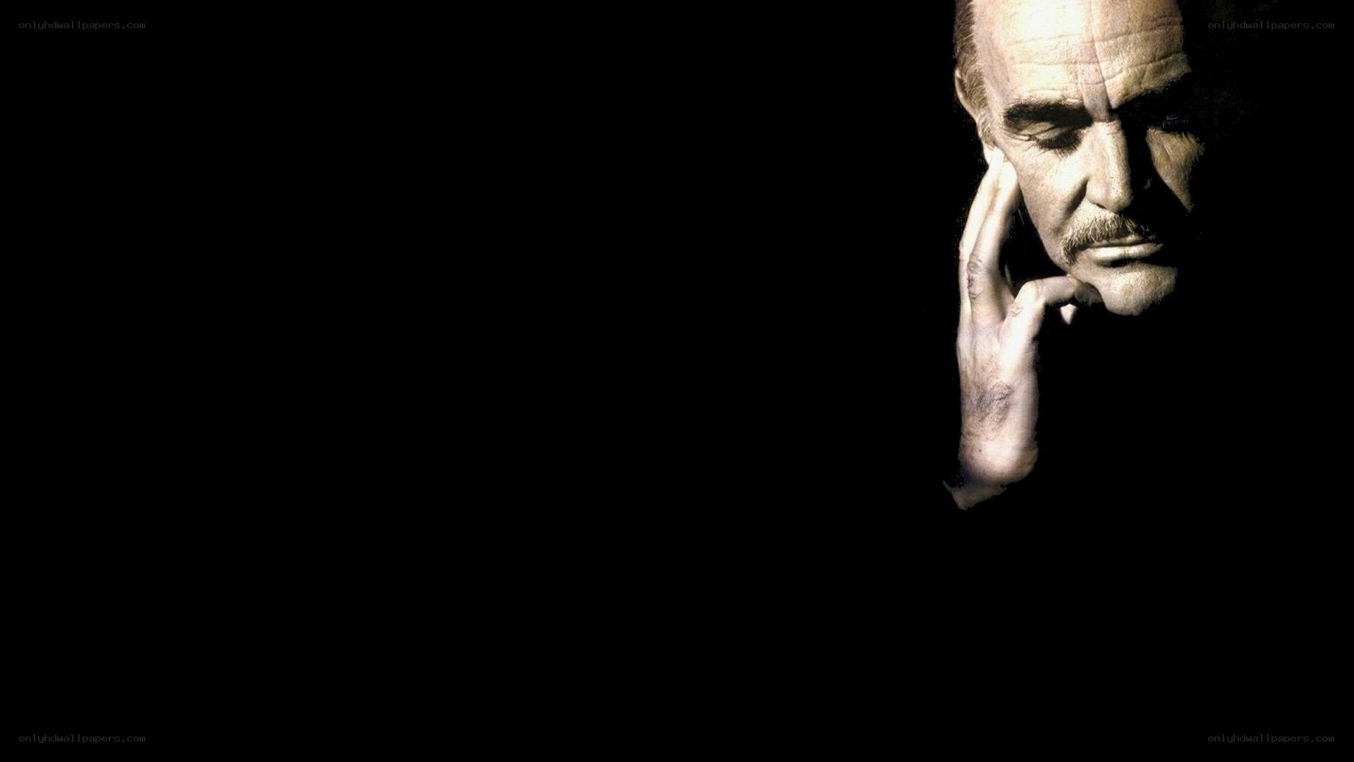 man in contemplative pose