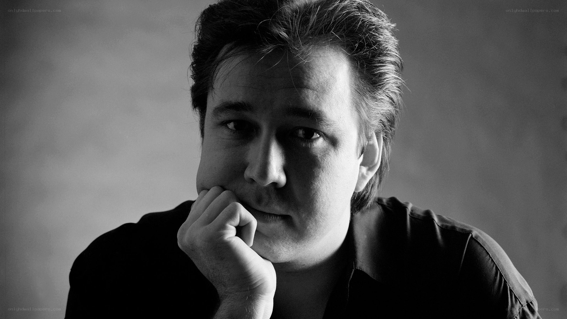 man in contemplative pose