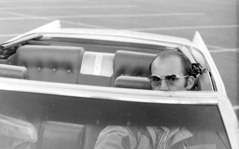 Man in Convertible Car