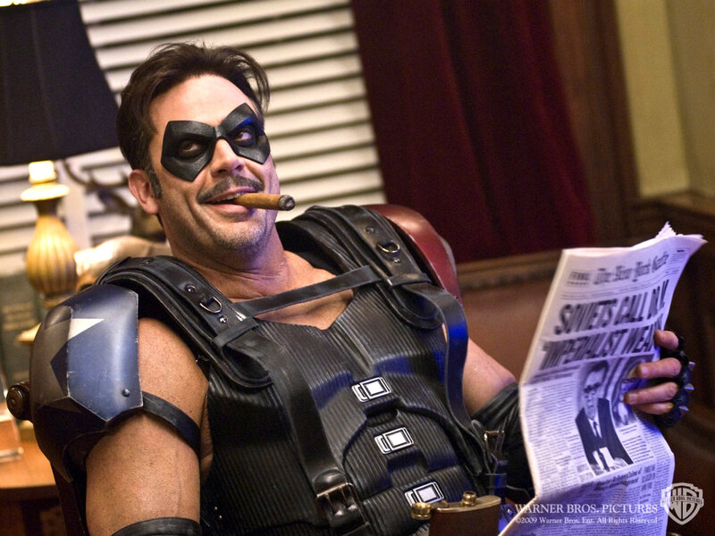 Man in Costume Reading Newspaper