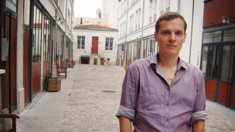 man in courtyard