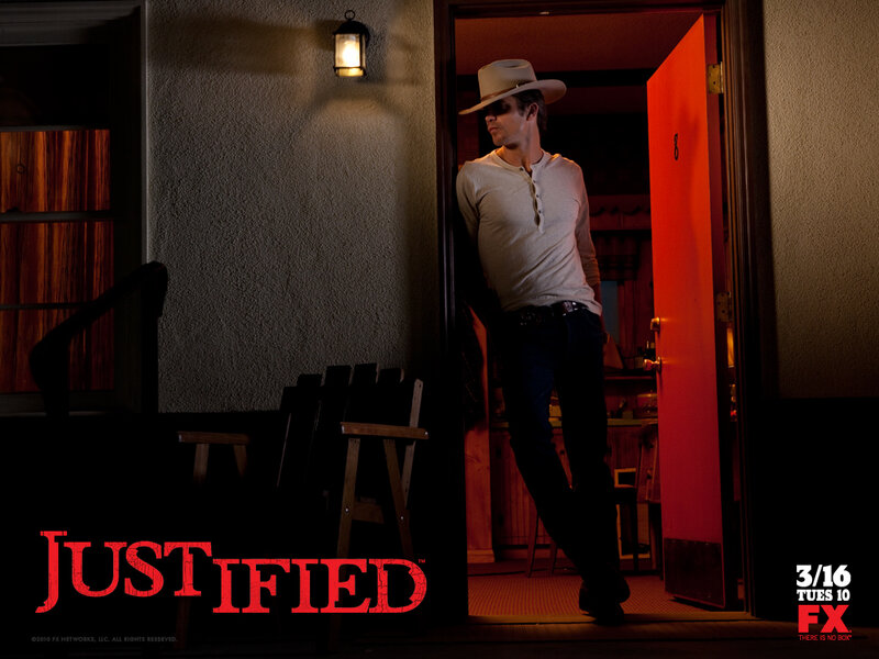 Man in cowboy hat at doorway