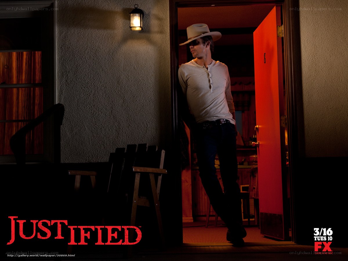 man in cowboy hat at doorway