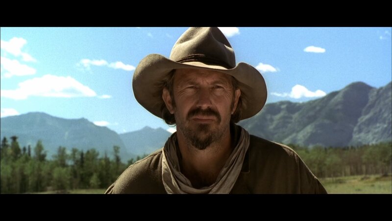 Man in Cowboy Hat — Brown, Serene, Afternoon