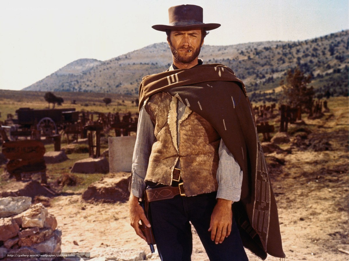Man in cowboy hat in desert