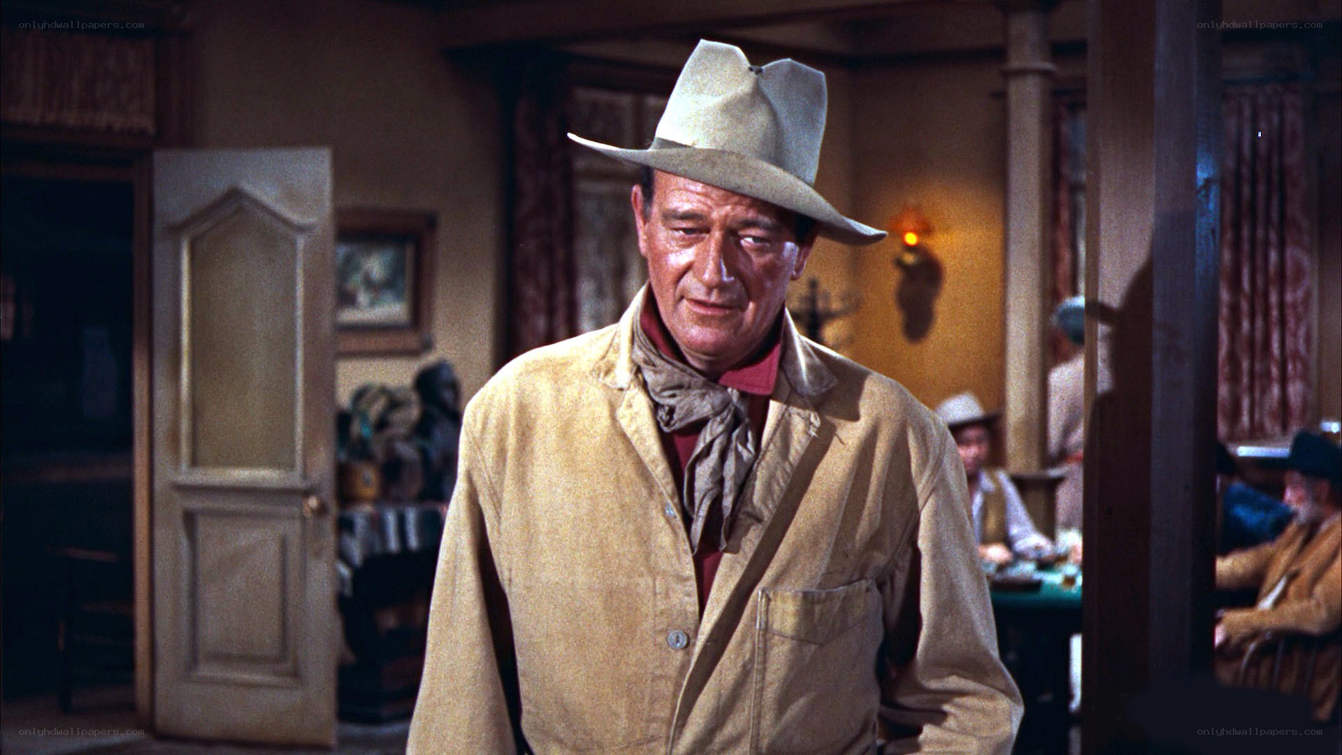 man in cowboy hat indoors