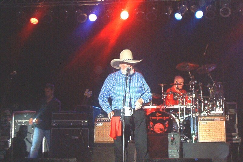 Man in Cowboy Hat on Stage