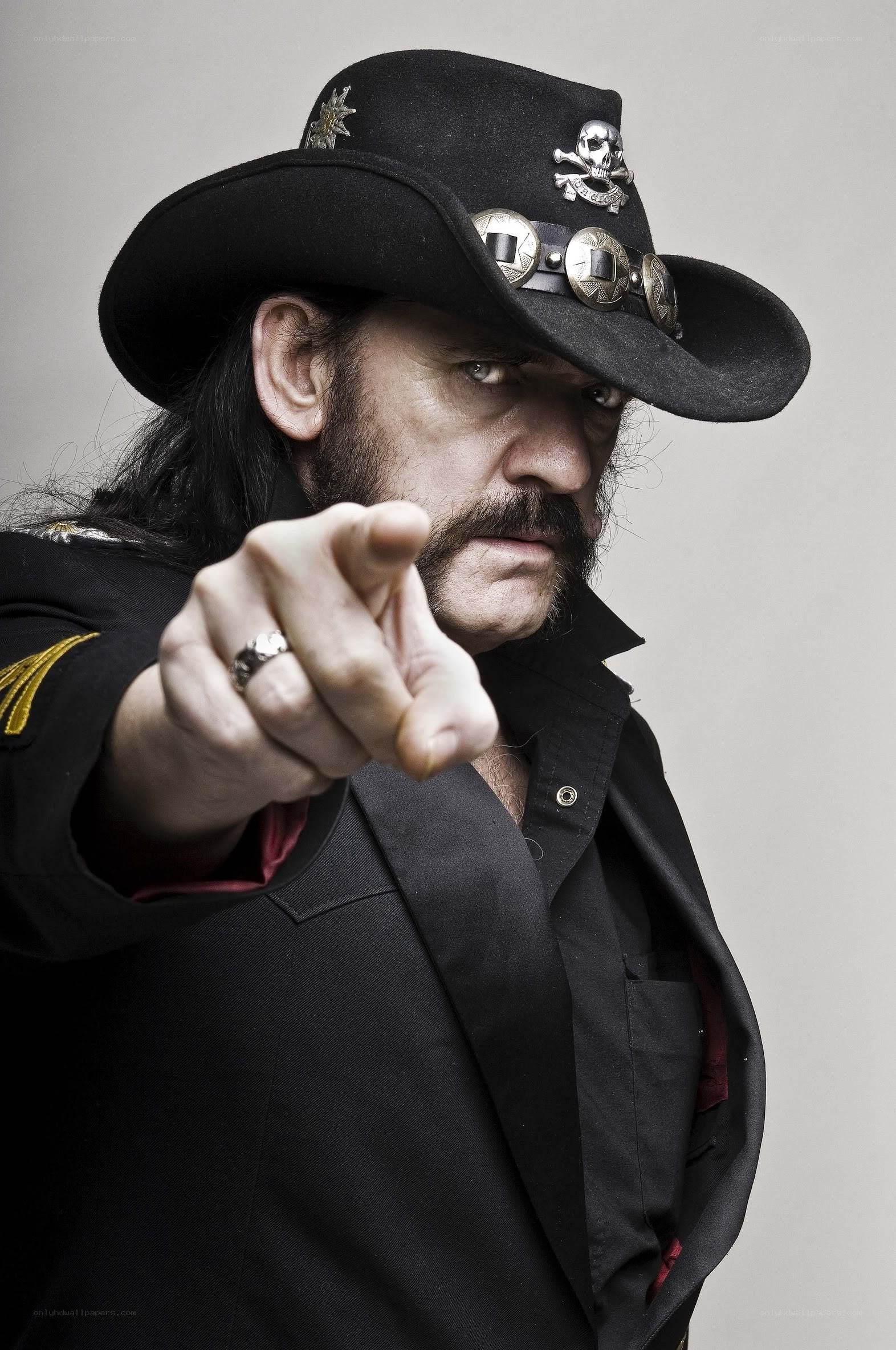 Man in cowboy hat pointing