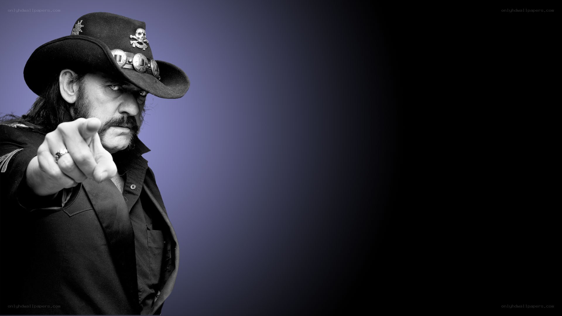 Man in cowboy hat pointing