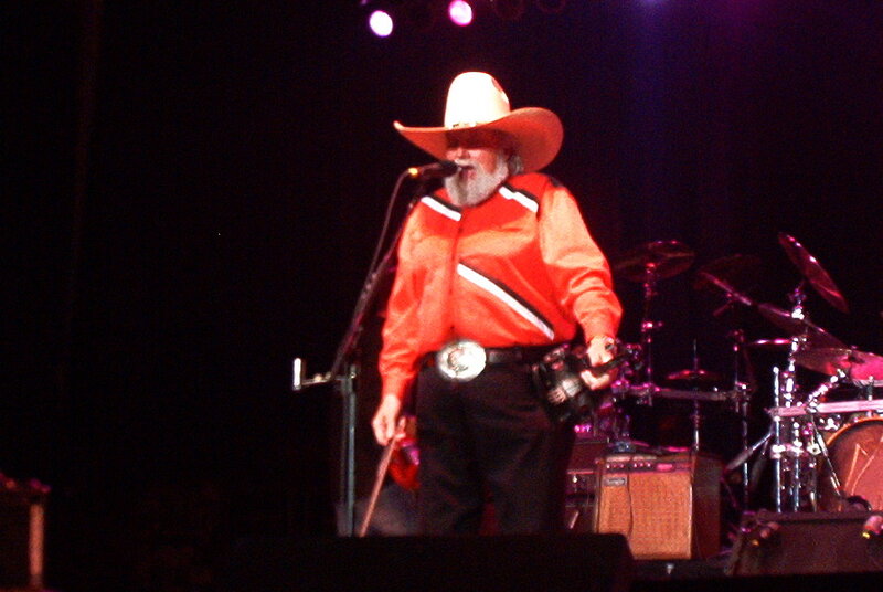 Man in Cowboy Hat Singing