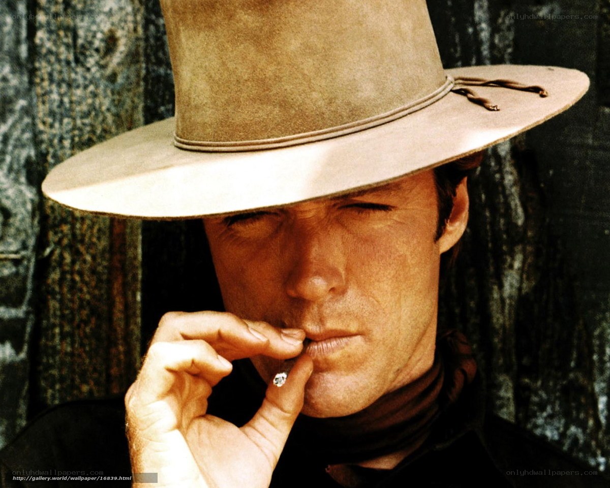 man in cowboy hat smoking