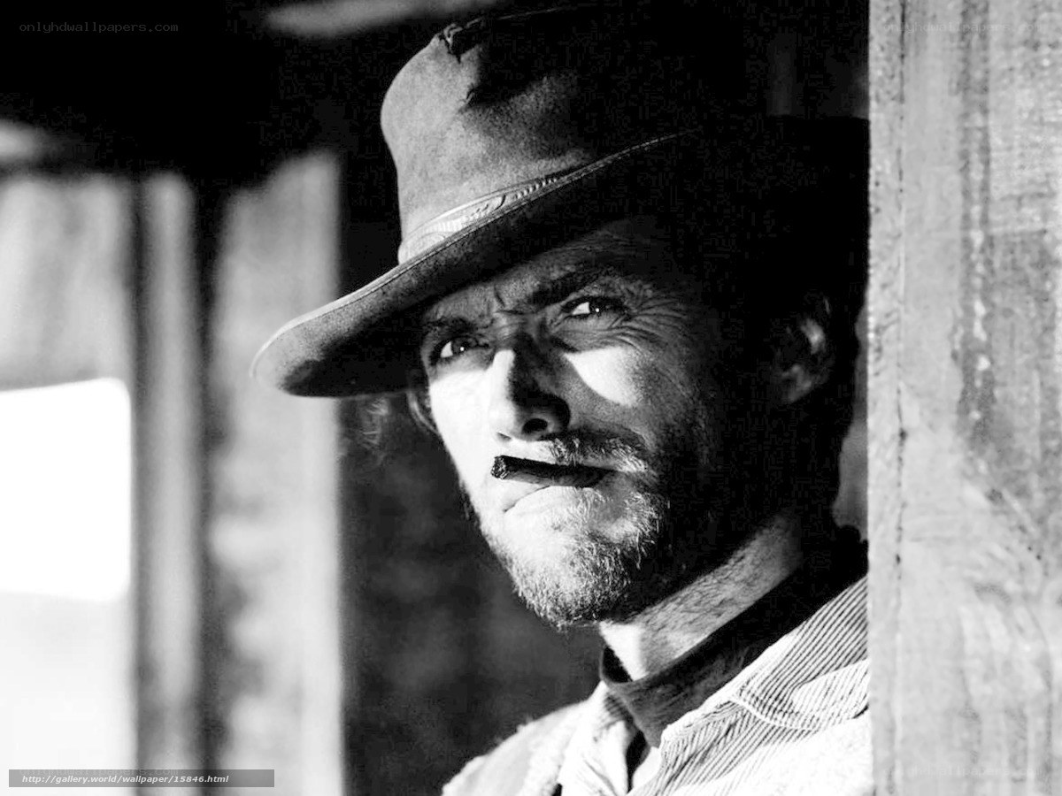 man in cowboy hat with cigar