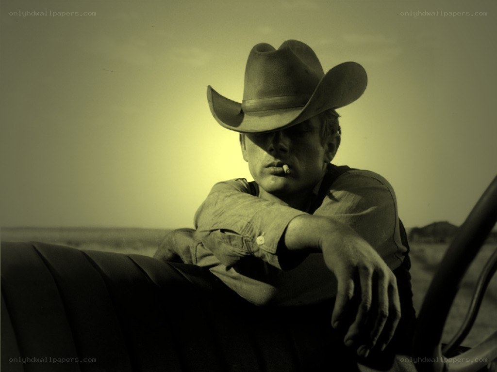 man in cowboy hat with cigarette