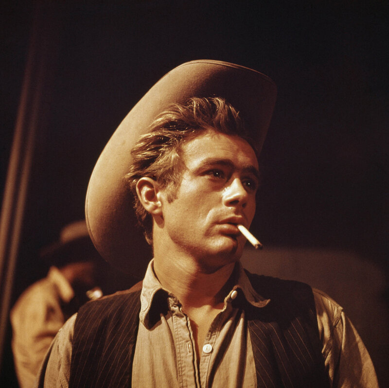 man in cowboy hat with cigarette