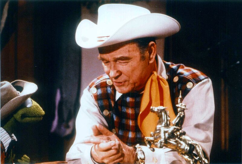 Man in Cowboy Hat with Puppet
