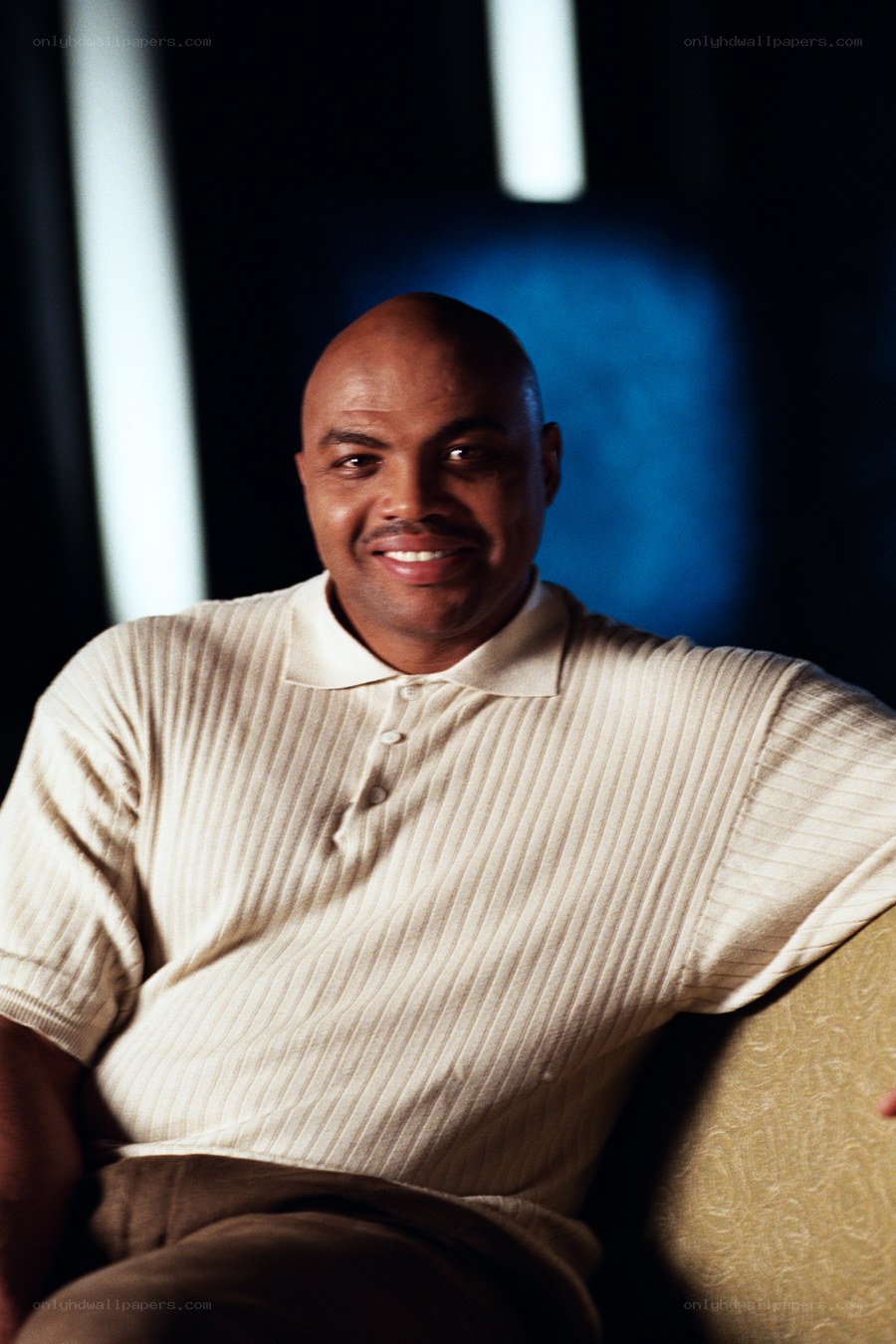 man in cream polo shirt