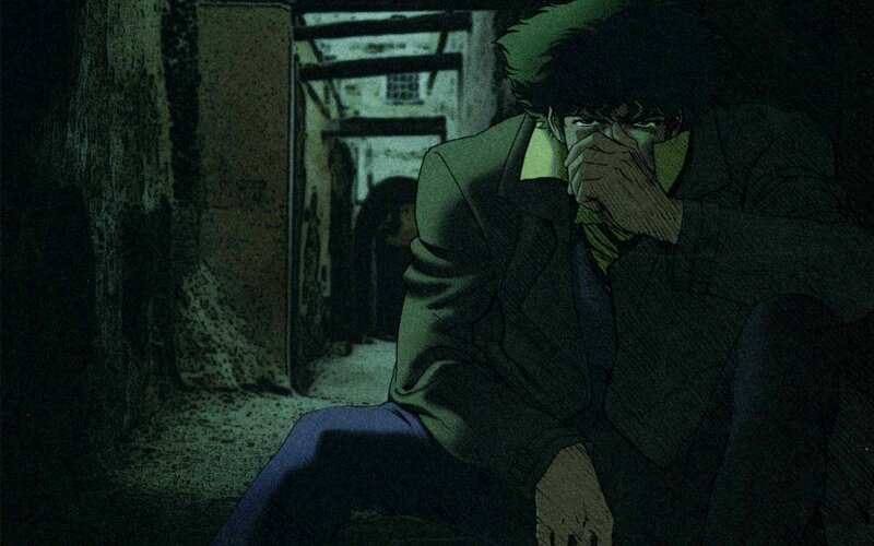 man in dark alley
