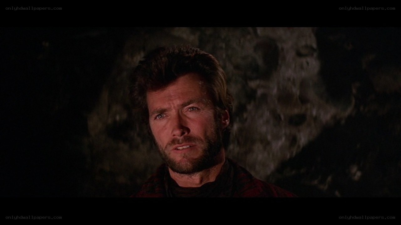 man in dark cave