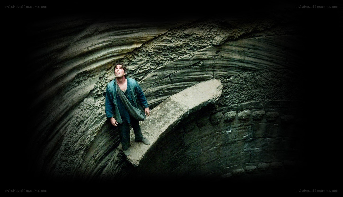 man in dark cave