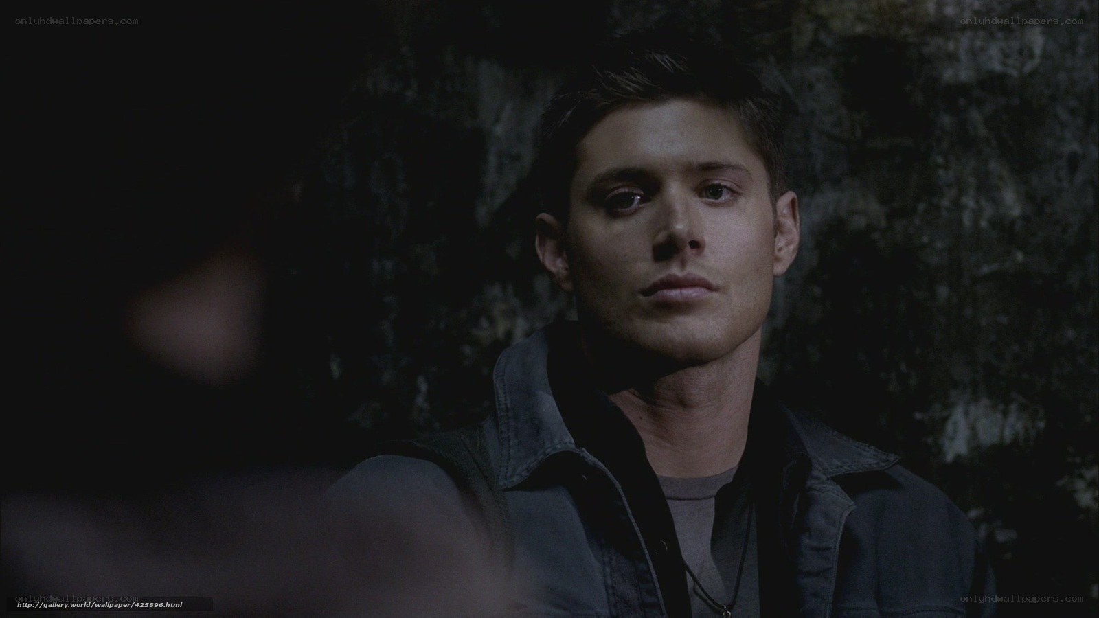 man in dark cave