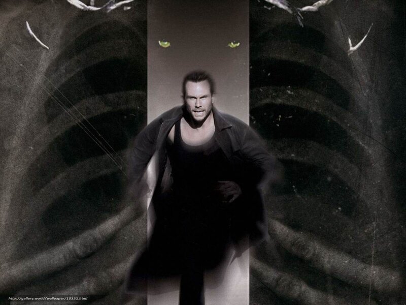 man in dark coat with skeletal ribs