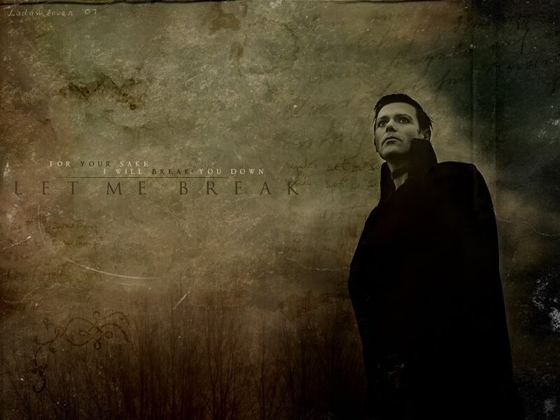 man in dark coat with text