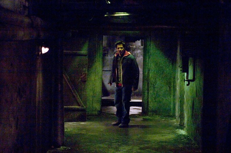 Man in Dark Hallway